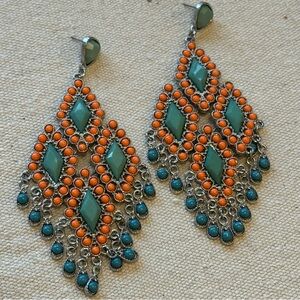 orange and blue large statement earrings